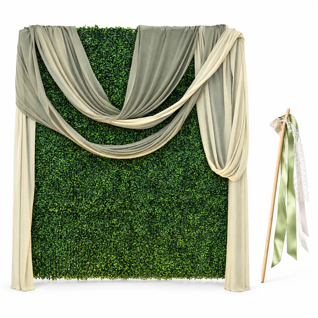 Faux boxwood greenery wall with sage and cream drapes beside a wooden yard stake with green, white and lace ribbons