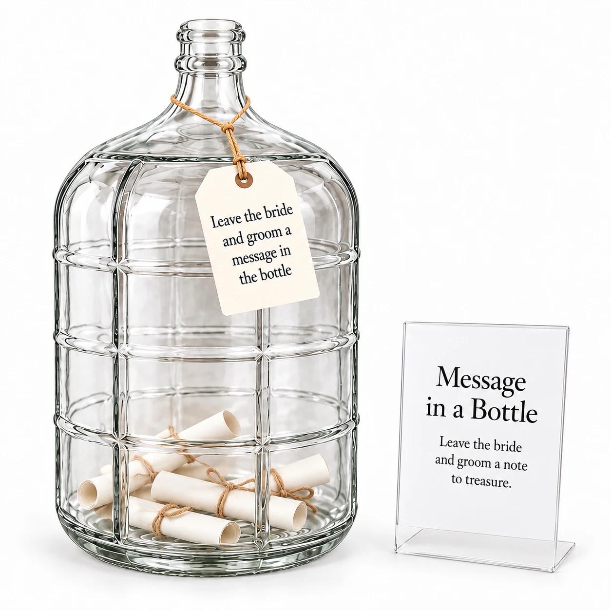 Large heavy glass message bottle with a customized hanging tag beside a clear acrylic sign