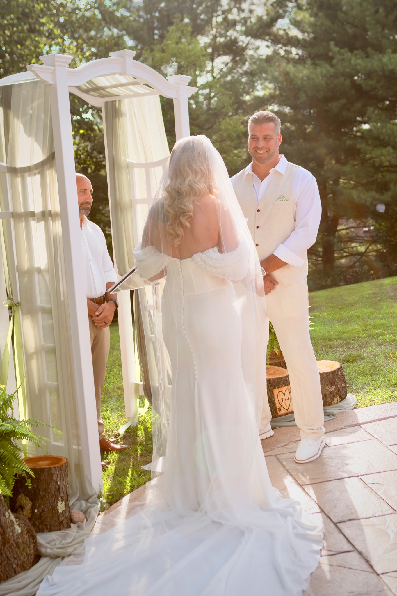 Jessie and Tom during their backyard wedding ceremony