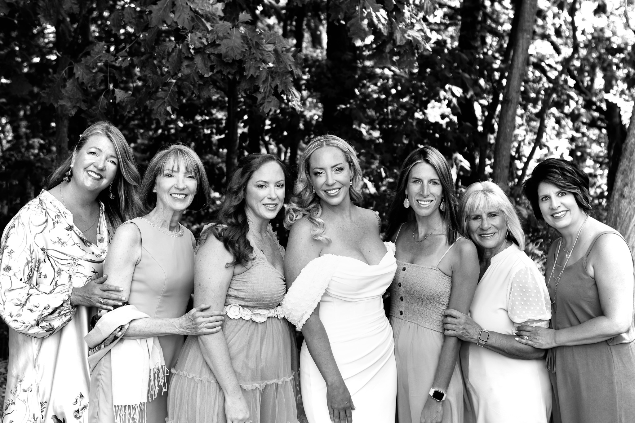 Jessie with women guests at her backyard wedding